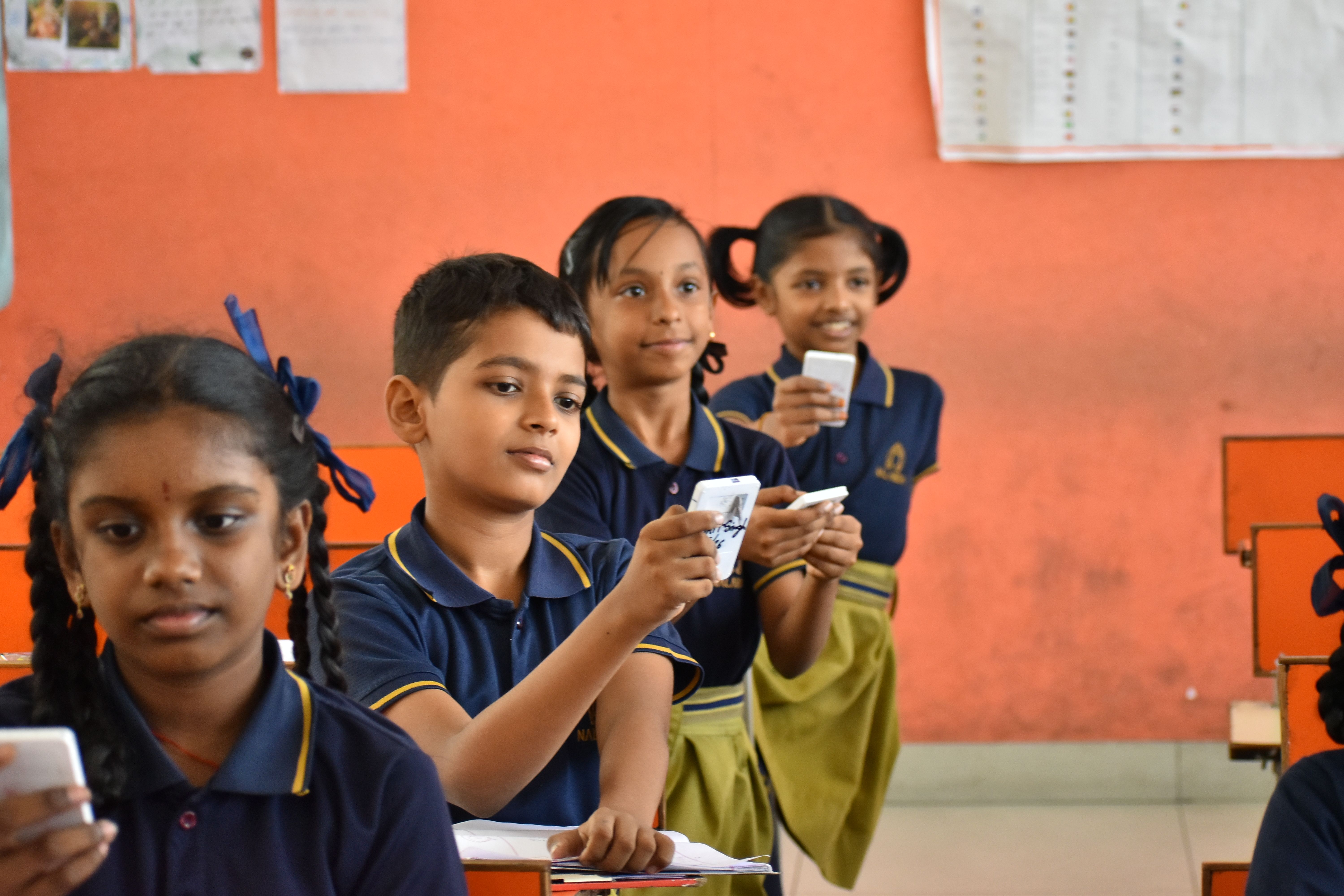 student writing on notebook