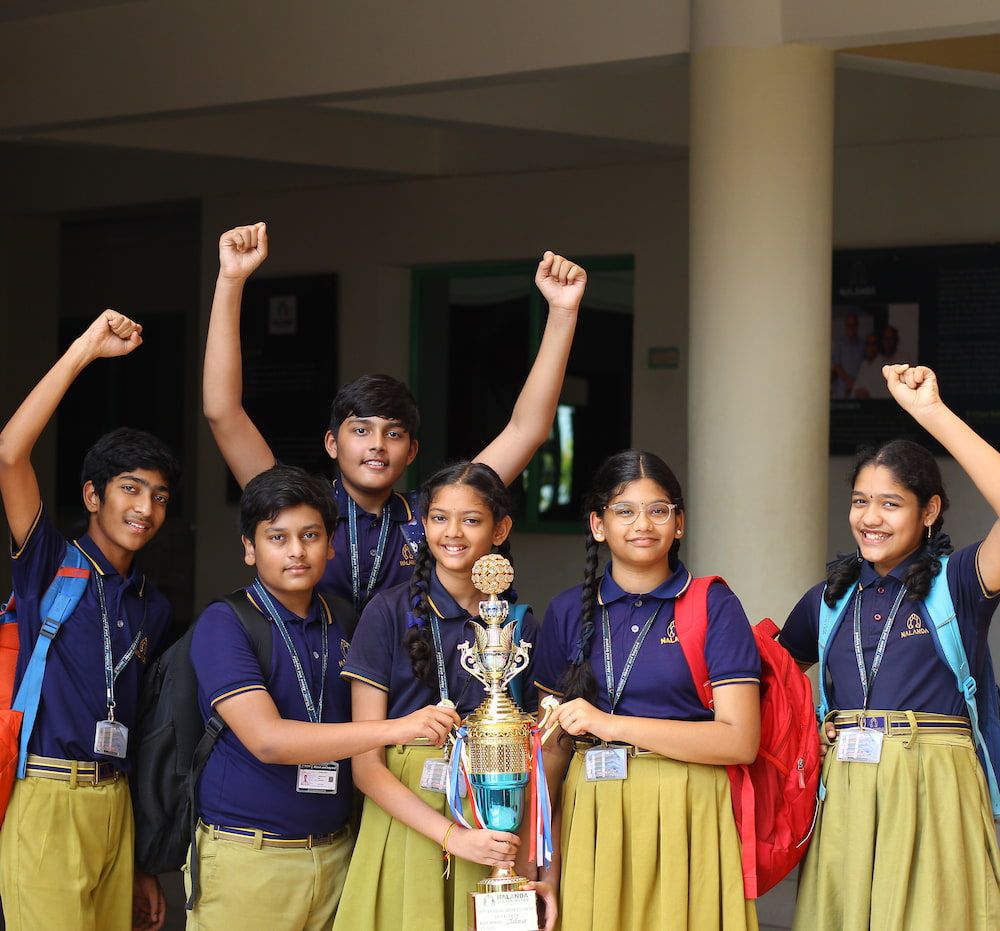 student writing on notebook